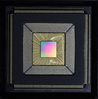 Princeton University researchers have developed a new computer chip called "Piton" (above) — after the metal spikes driven by rock climbers into mountainsides to aid in their ascent — that was designed specifically for massive computing systems. The chip could substantially increase processing speed while slashing energy usage, and is scalable, meaning that thousands of chips containing millions of independent processors can be connected into a single system. It was presented Aug. 23 at Hot Chips, a symposium on high-performance chips held in Cupertino, California. (Photo by David Wentzlaff, Department of Electrical Engineering)